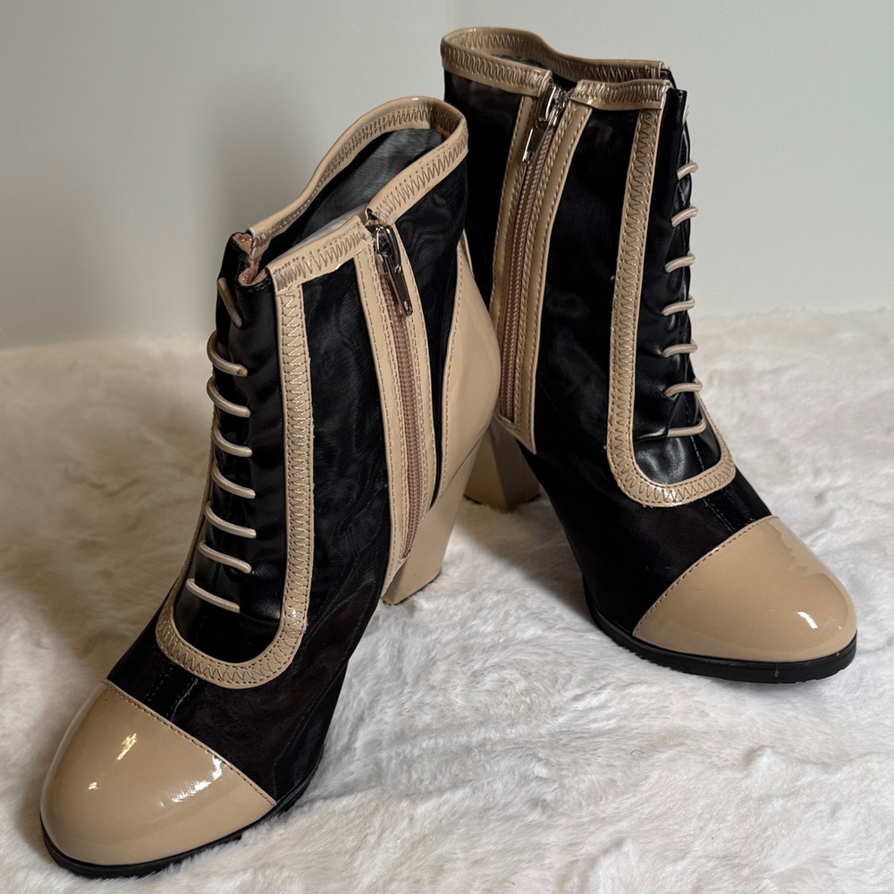 Kelsi Dagger Black and Tan Lace Up Boots